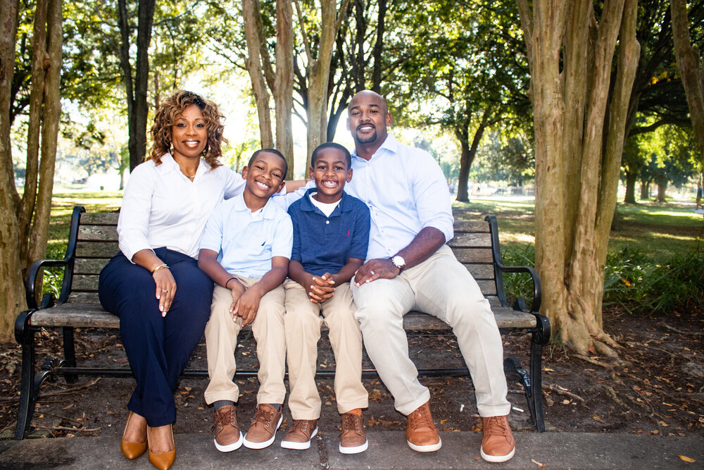 Dr. Albert D. Chester pictured with his wife, Dr. Melissa Noland-Chester, and their two sons, Aiden (9) and Alex (7)